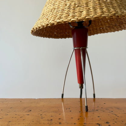 A vintage tripod table lamp from the Netherlands circa 1950s in the iconic midcentury space-age style. Burgundy/red colored wood and metal base in good vintage condition.