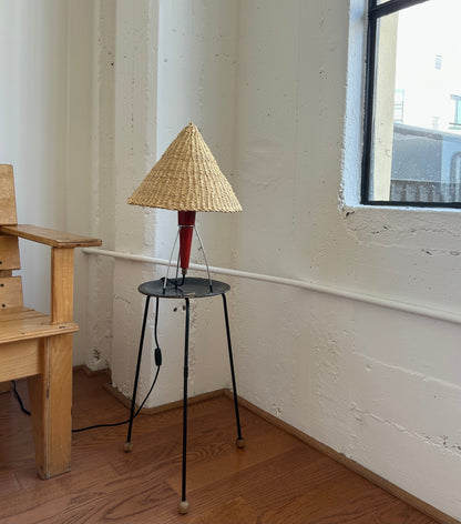 A vintage tripod table lamp from the Netherlands circa 1950s in the iconic midcentury space-age style. Burgundy/red colored wood and metal base in good vintage condition.