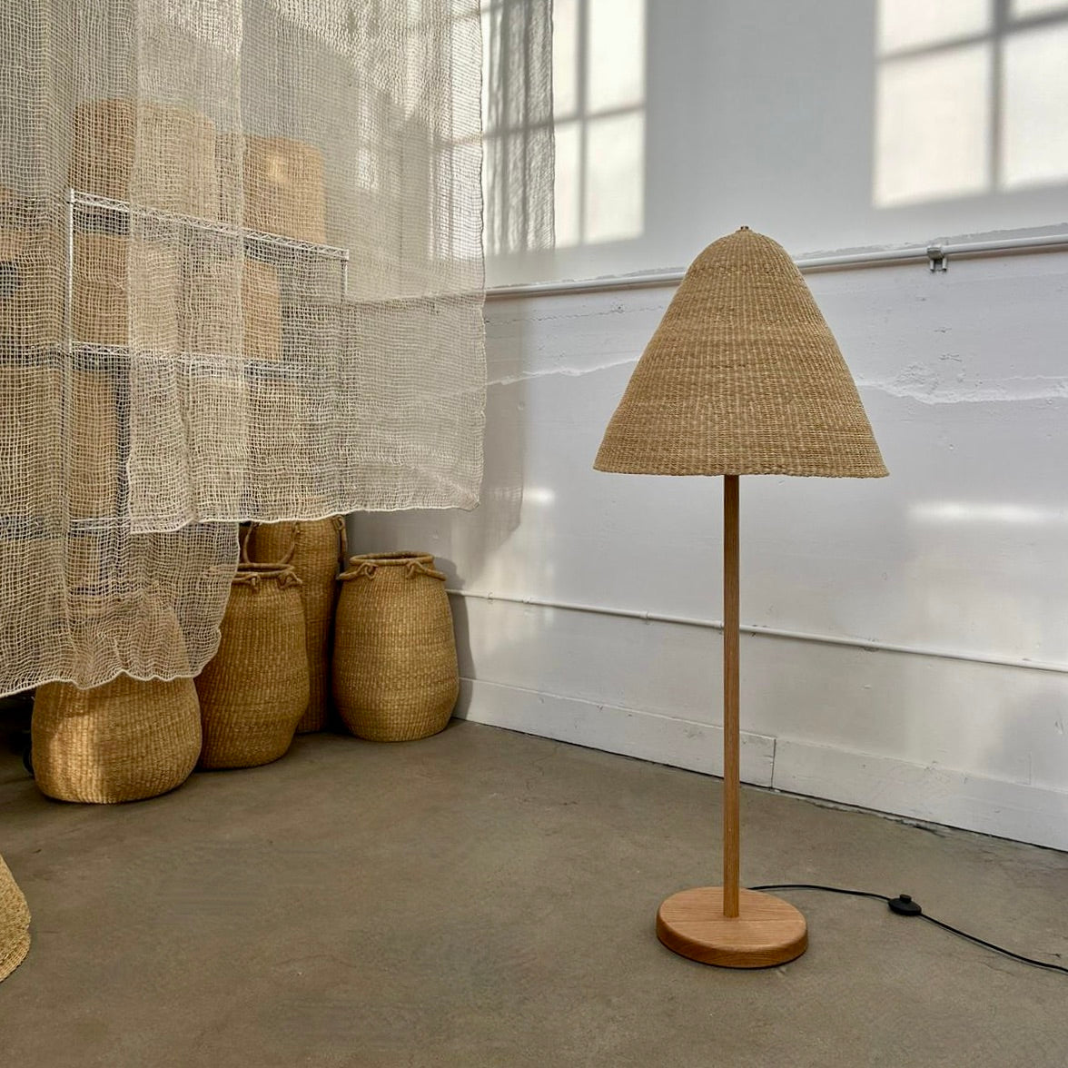 Large Bonnet light shade. Handwoven in Ghana with natural materials. These large natural colored shades are a rounded cone shape.