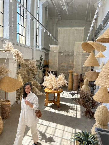 Twenty One Tonnes Studio in LA, full of hand woven baskets and light shades.