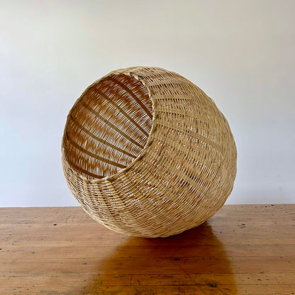 The Brava Light is a large, hand-woven, egg-shaped, ceiling-mounted pendant light, made from a bamboo-like river reed by skilled craftspeople in Oaxaca, Mexico. A perfect light for kitchens, hallways, and living rooms. 