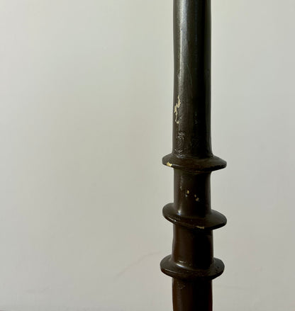 A vintage, iron 'Tête de femme' style floor lamp in the manner of Alberto Giacometti.