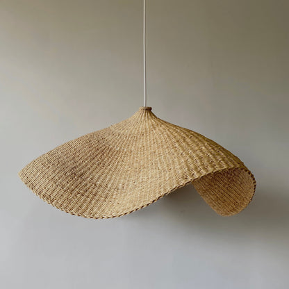 Living room ceiling light shades, hand woven in natural dried grass.