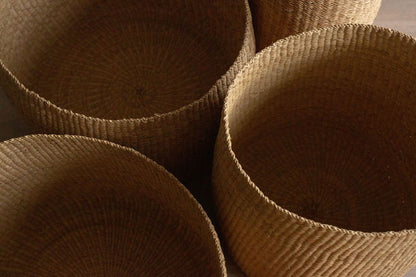 Natural hand woven storage baskets.