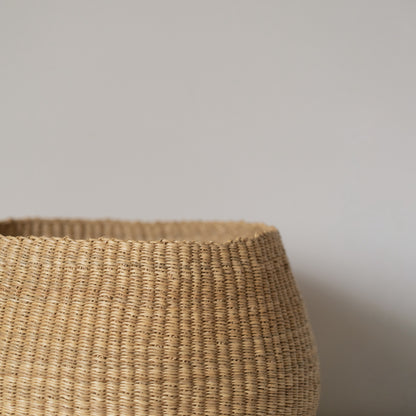 Hand crafted basket made from grass