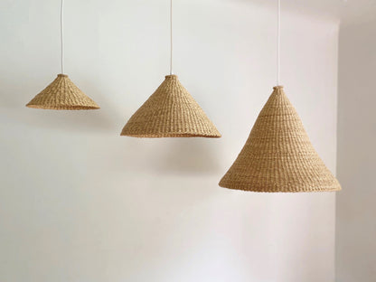 Three natural colored woven light shades, handmade in Ghana.