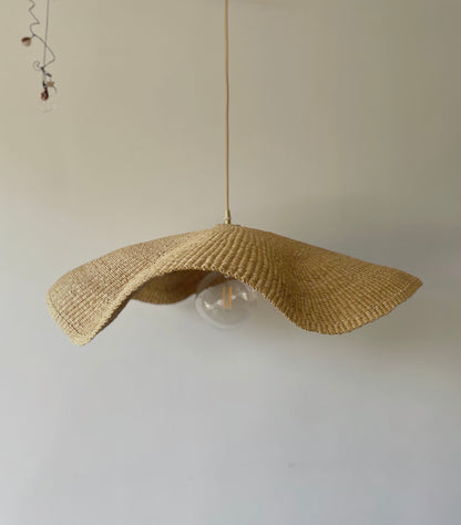 Hand woven light shade for hallway