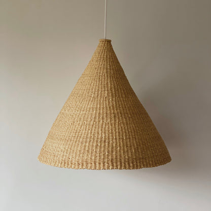 Bonnet light shade, handwoven from sustainable elephant grass in Ghana. Natural colored, conical shaped shades - perfect for bedrooms, hallways, kitchens and living spaces.