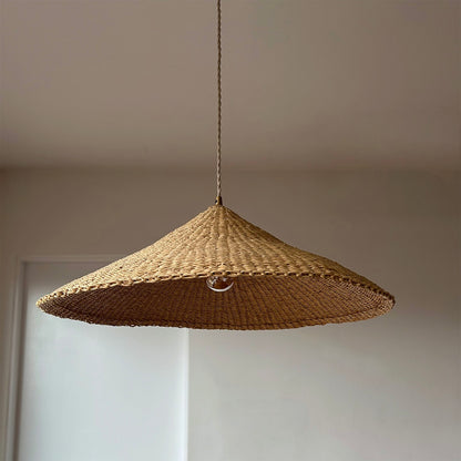 The Sunhat pendant light is a shallow cone shape, handwoven from natural colored, sustainable elephant grass in northern Ghana. With its classic shape this pendant is ideal for any living space.