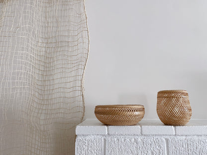 Two bamboo baskets, handcrafted and hand woven by Japanese artist Mie Kodama.